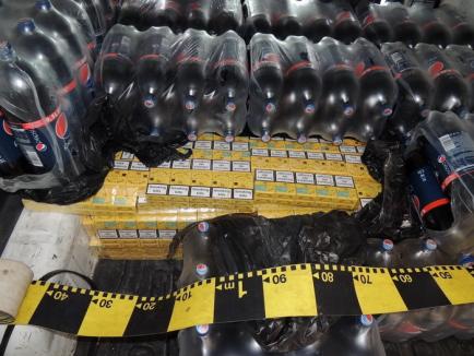 Peste 4.000 de pachete cu ţigări descoperite în maşina unui orădean. Proprietarul a fost reţinut!